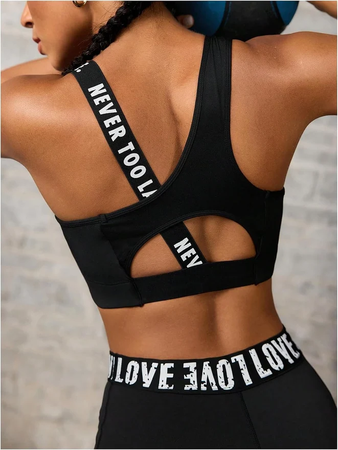 Letter Print Sports Bra Asymmetrical Neck Cut Out Medium Support by OYOANGLE, photograph 2 of 4