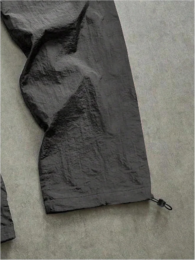 Drawstring Waist Letter Graphic Baggy Pants Y2K Slogan Trousers by OYOANGLE, photograph 2 of 3