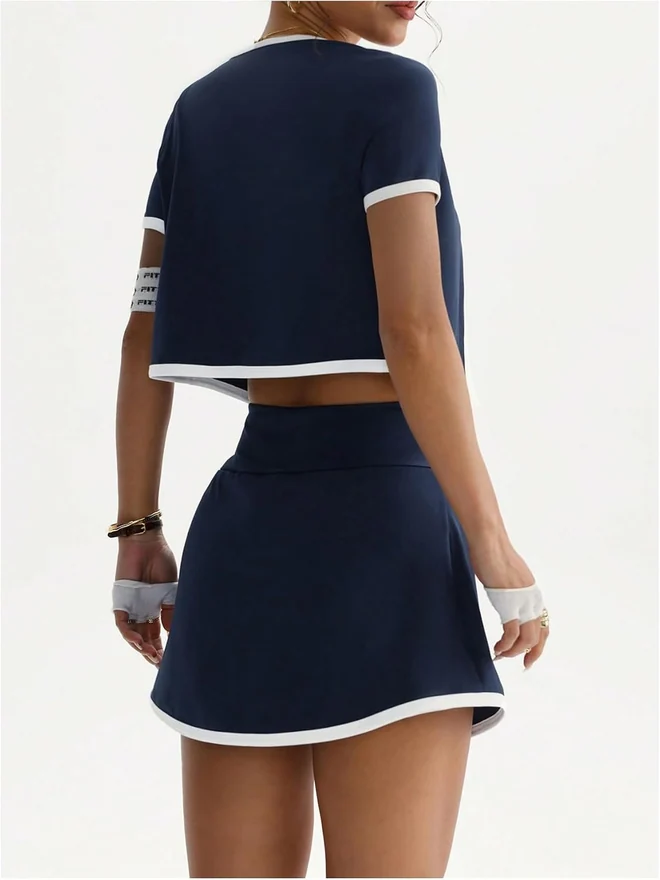 Workout Sets for Women 3 Piece Cropped Sports Top Mini Skirt Set by OYOANGLE, photograph 2 of 3