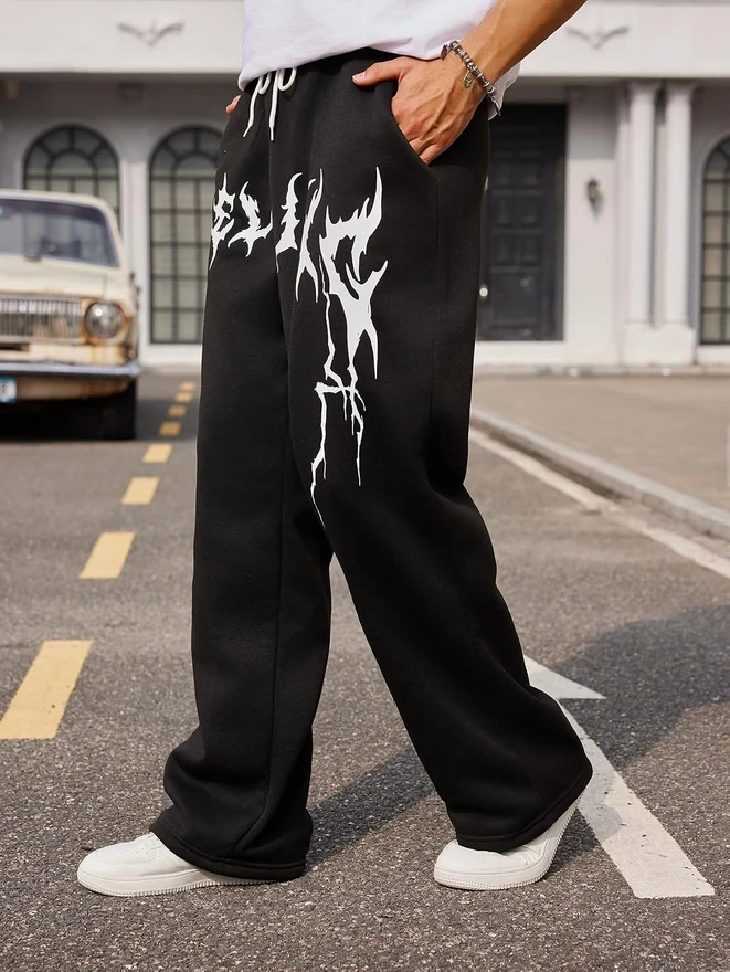 Graphic Print Drawstring Waist Baggy Sweatpants Loose Pants by OYOANGLE, photograph 2 of 3