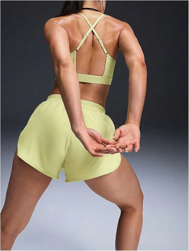 Workout Sets for Women 2 Pieces Halter Sports Bra Top and Shorts by OYOANGLE, photograph 2 of 4