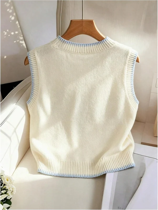 Seashell Sleeveless Crew Neck Sweater Vest Light Yellow by OYOANGLE, photograph 2 of 4